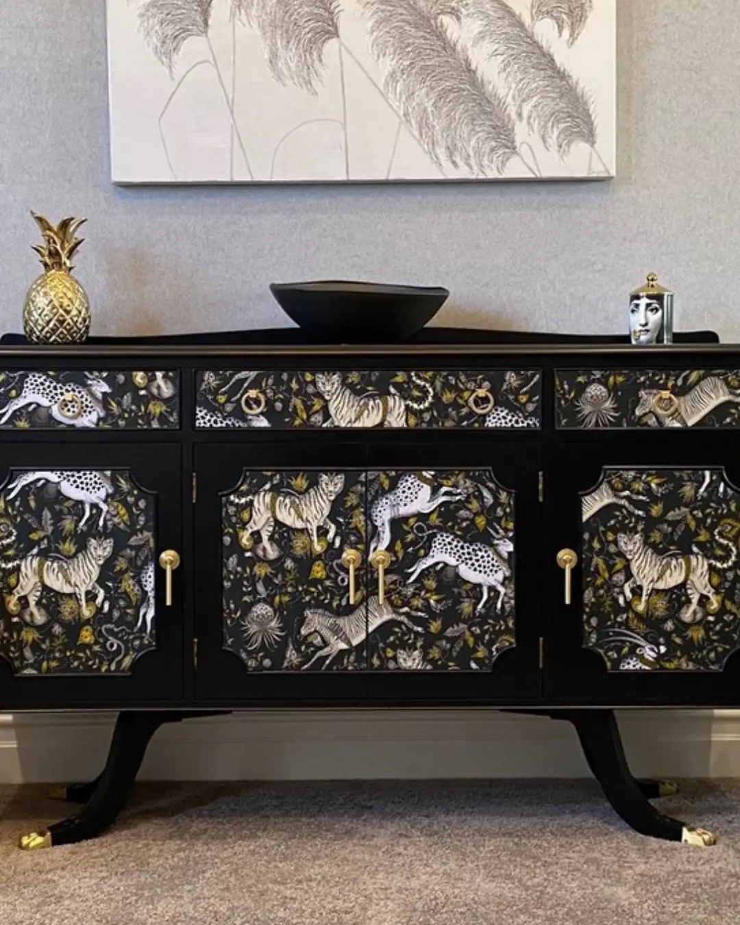 Amazing up styled antique furniture with black and white animal theme and gold details, work by Totally Digital Agency Auckland for client Shopify Marketing